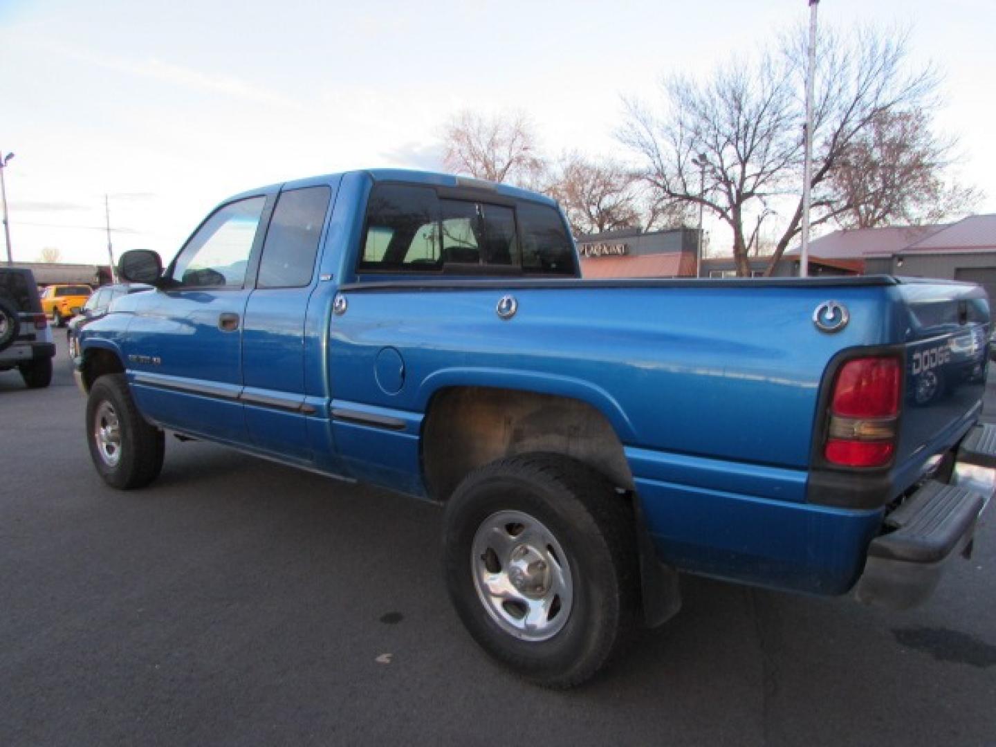 1999 Blue /Gray Dodge Ram 1500 SLT (3B7HF13Y9XG) with an 5.2 V8 Engine engine, 5 speed manual transmission, located at 4562 State Avenue, Billings, MT, 59101, (406) 896-9833, 45.769516, -108.526772 - Photo#1